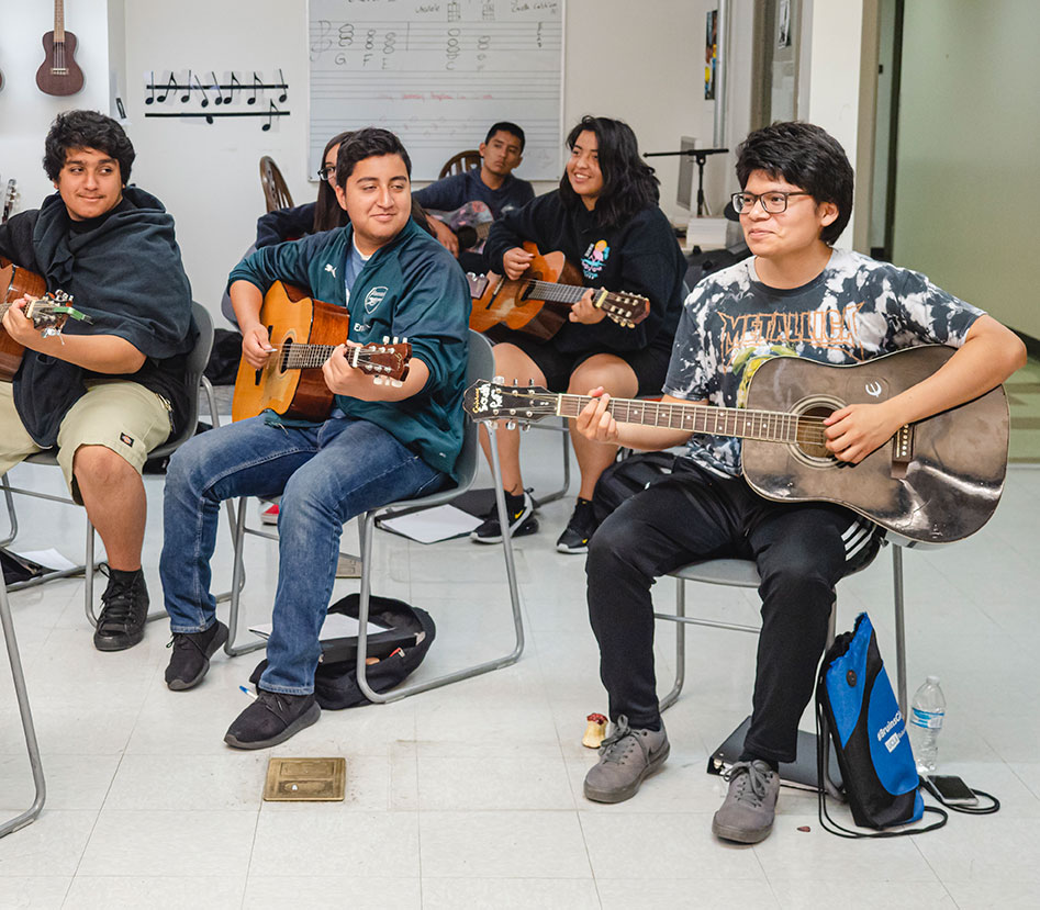students playing guitar