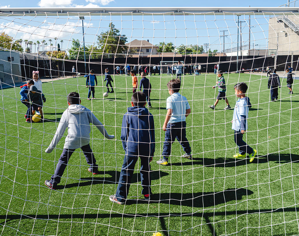 students playing soccer